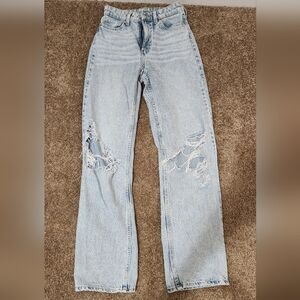 Ripped high waisted wide-legged jeans